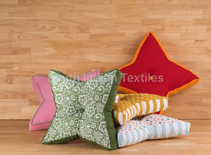 Star shaped and printed cotton cushions